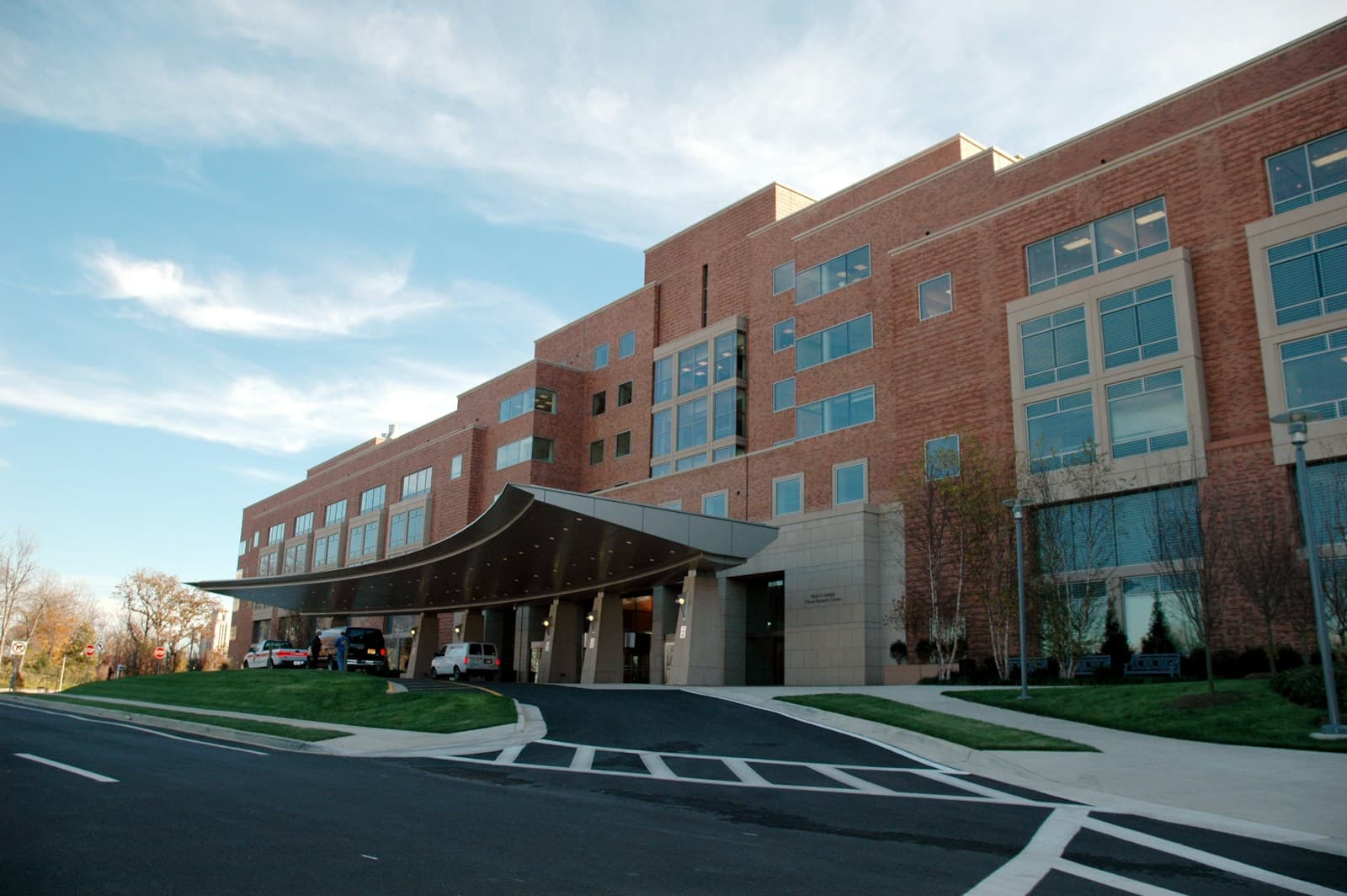 Illustration of a modern, welcoming multispecialty hospital building.